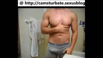 Web cam a muscular guy masturbates jerks off with a towel